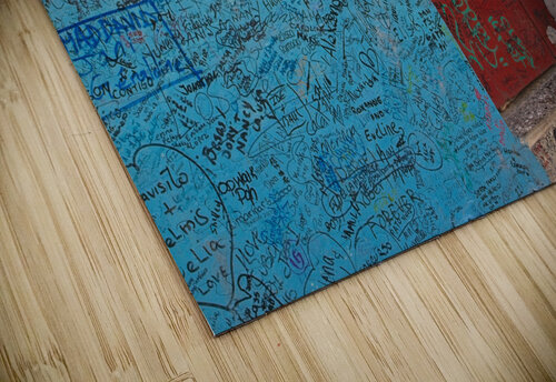 Graffiti-Covered Wall with Seated Man Chirag Pandya puzzle