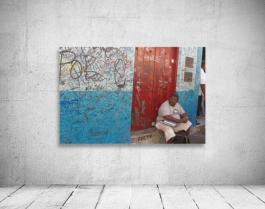 Graffiti-Covered Wall with Seated Man Wall Preview